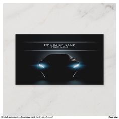 a business card with the image of a car on it's front and side