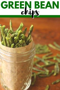 healthy and easy green bean chips keto in a mason jar on a wooden table