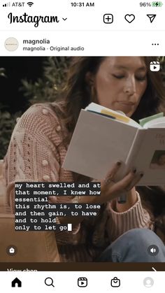 a woman reading a book while sitting on a couch with an instagram message above her