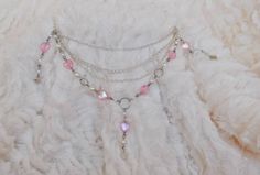 This gorgeous choker and earring set, features a 12" silver plated chain choker (with a 5cm extender chain), decorated with a layer of iridescent hearts and faux pearl beads: and a matching pair of dangle earrings, made with a silver plated ear hook. All items are packaged in a sanitized area and are carefully wrapped in tissue paper and shipped in a secure bubble lined envelope, all orders come with some adorable stickers and mini sweets as a free thankyou gift! All orders will be shipped withi Handmade Adjustable Pastel Goth Jewelry, Fairy Grunge Silver Dangle Jewelry, Silver Fairy Grunge Dangle Jewelry, Silver Fairy Grunge Necklaces For Festivals, Handmade Fairy Kei Jewelry For Party, Fairy Grunge Silver Beaded Jewelry, Handmade Fairy Grunge Necklaces For Party, Fairy Grunge Handmade Necklace For Party, Fairy Grunge Handmade Party Necklaces