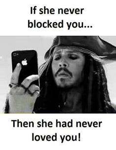 a man in a pirate hat holding up his cell phone to take a selfie with the caption if she never blocked you, then she had never loved you