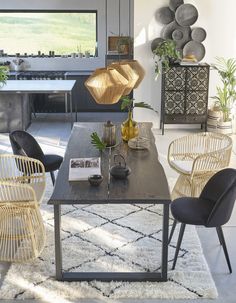 a living room filled with furniture and decor