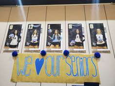 the volleyball team is hanging on the wall