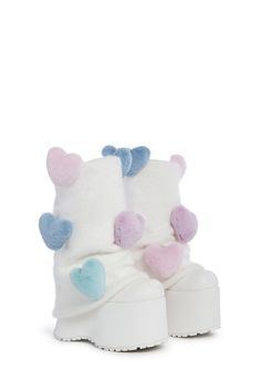 give 'em plushie power! These adorable platform boots have a vegan leather construction, detachable faux fur leg warmers with colorful 3D hearts, side zip closures, and rubber treaded outsoles. Cheap Platform Boots, Cinnamon Roll Shoes, Plus Size Leg Warmers, Cute Chunky Shoes, Cool Shoes Women, Heart Platform Boots, Dolls Kill Boots, Puffy Boots, Kawaii Boots