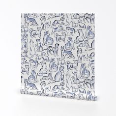 a blue and white paper bag with an image of dogs on it, sitting against a white background