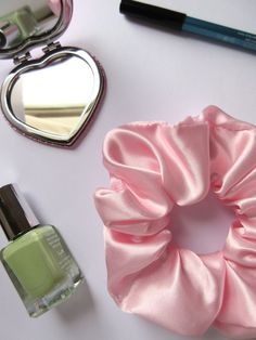 Handmade baby pink satin scrunchie. The perfect accessory to finish off any outfit! Free 2nd Class Royal Mail delivery to the UK All products come in recycleable, or reused packaging #scrunchies #pastel #satin #fashion #accessories #hair #hairbands #silk #outfit #ootd #vsco #cottagecore #childrens #jewellery #hairstyles #stockingfiller #gift #christmas #present #idea #pink #birthday Pink Satin Scrunchie, Baby Pink Satin, Reused Packaging, Satin Fashion, Silk Outfit, Electroformed Jewelry, Small Boutique