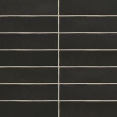 a black and white tile wall with horizontal lines