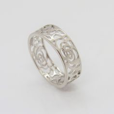 Vintage Sterling Silver Rose Flower Band Ring ...Marked 925...Total of weights 2.4grams...Size 8...Measure of Band 6.5MM...It's in very good condition. Elegant Silver Rings With Rose Design, Elegant Sterling Silver Ring With Rose Design, Formal Flower Shaped Rings With Rose Design, Promise Ring With Rose Design, Formal Flower-shaped Ring With Rose Design, Formal Rose Flower Shaped Rings, Formal Rose Flower Rings, Formal Flower-shaped Rose Design Ring, Formal Flower Shape Rose Design Ring