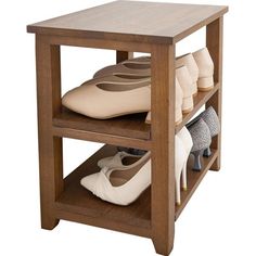 two tiered wooden shoe rack with three pairs of women's shoes on it