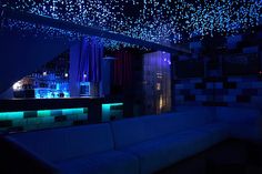 a living room filled with lots of blue lights