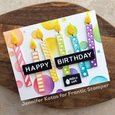 a happy birthday card with candles on it