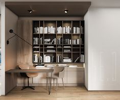 a room with a desk, bookshelf and chairs