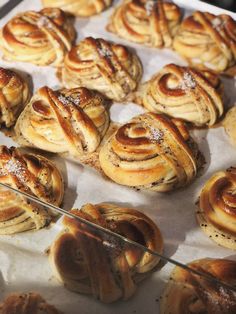 many different types of breads on a tray