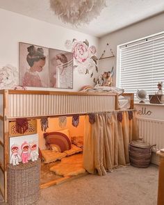 there is a loft bed with curtains on the top and bottom bunk beds below it