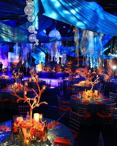 an image of a banquet room setting with blue lighting