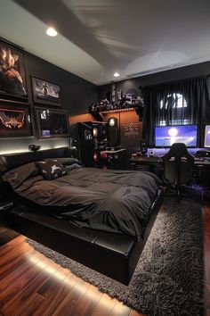 a bed sitting in a bedroom next to a desk with a computer on top of it