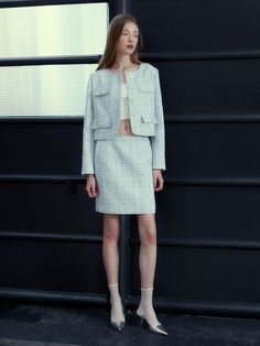 Based on classicism and minimalism, MUSEE expresses understated and refined beauty and pursues values that do not change over time.- Premium tweed used mini skirt- Subtle glossy material gives a luxurious mood- Bright colors of yarn form a check pattern- H-line silhouette and moderate length skirt Elegant Mini Skirt Suit For Spring, Elegant Tweed Skirt For Spring, Elegant Mini Tweed Dress, Chic Office Tweed Mini Skirt, Formal Tweed Mini Skirt, Elegant Tweed Mini Skirt Dress For Work, Elegant Tweed Mini Skirt For Formal Occasions, Formal Elegant Tweed Mini Skirt, Elegant Fitted Tweed Mini Dress