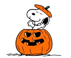 a cartoon character sitting on top of a pumpkin