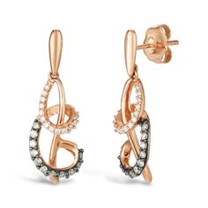 PRICES MAY VARY. UNMISTAKABLE ELEGANCE - These glamorous handcrafted 14k rose gold earrings by Le Vian feature graduated posts that dangle a long column of rose gold with a spiral of diamonds encircling it. The first loop of the spiral features white diamonds while the second loop features fancy brown diamonds. These 1” dangle style stud earrings feature friction posts and butterfly backs for comfortable and secure wear all day long. These striking earrings are the subtle statement piece you’ve Chocolate Diamond Earrings, Levian Jewelry, Chocolate Diamond, Chocolate Diamonds, Le Vian, Diamond Dangle Earrings, Spiral Earrings, Gold Diamond Jewelry, Leverback Earrings