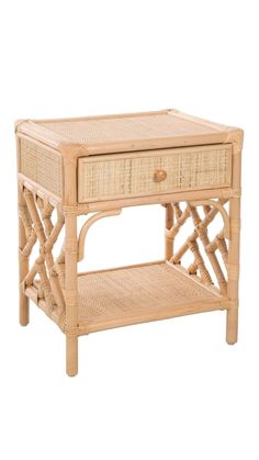 an end table with wicker drawers on it