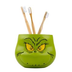 PRICES MAY VARY. 100% Polyresin ITEM INCLUDES: One Grinch toothbrush holder measuring 4" x 4.5", fabricated from poly resin with a matte finish, perfect for adding a whimsical and festive touch to your bathroom décor or any room. VERSATILE USE: Ideal for holding toothbrushes, makeup brushes, pens, and other small items, this Grinch holder adds a whimsical touch to your space. Its durable poly resin construction and compact size make it perfect for any countertop, dresser, or desk, keeping your a Grinch Table Setting, Grinch Bathroom Decor, The Grinch Christmas Decorations, Grinch Christmas Party Ideas, Grinch Party Ideas, Grinch Decor, Grinch Christmas Party, Grinch Party, Grinch Christmas Decorations