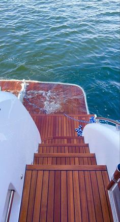 the deck of a boat that is in the water