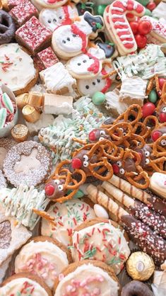 an assortment of cookies and pastries on display