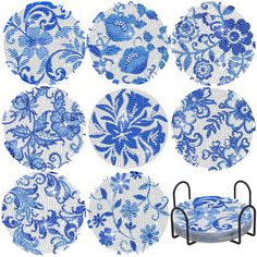 six blue and white plates with designs on them