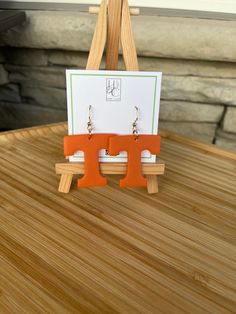 Get ready to cheer on the UT Vols with these bold Power T earrings! Choose the variation you love best! Made with durable polymer clay and nickel-free fishhook earrings. Ut Vols, Fishhook Earrings, Tennessee Vols, Unique Gifts For Women, Fish Hook Earrings, Earrings Unique, Unique Earrings, Wedding Shop, Gift Registry