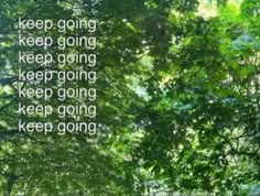 the words keep going and keep going are in white letters on green leaves above trees