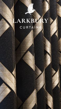 black and gold curtains with the words larkbury curtaining