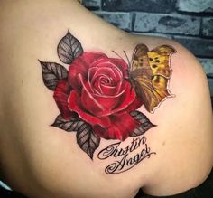 a woman's back with a rose and butterfly tattoo on her left side shoulder