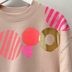 Geometric Pattern Statement hand screen-printed Women's quality sweatshirt.  *Please note I print to order so allow 5 days for the order to be processed* Made from 100% combed organic cotton,Earth positive, fair-trade garment.  Brushed 3-ply 9.44 oz / 320 g The Sweatshirt colour is 'Misty Pink' which is a soft pale pink   Screenprinted by myself in Brighton using water based inks. Gold foil on detail AVAILABLE IN SIZES:  SMALL, MEDIUM, LARGE and XL *PLEASE REFER TO SIZE CHART IN PHOTOS FOR MEASU Cool Sweatshirts For Women, Sweatshirt Print, Jeweled Shoes, Unique Sweatshirt, Womens Sweatshirts, Neon Coral, Old Clothes, Hand Screen Printed, Hand Print