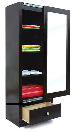 a black cabinet with drawers and a mirror on it's side that is open