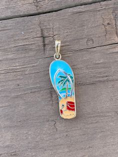 The Flip Flop measures 21mm long (whithout bail) and 8.5mm wide. The flip flop is mostly yellow gold with a white gold strap The pendant weighs 8.9g. Pendant stamped 14k yellow gold on the inside of the bail. Adjustable T-strap Flip Flops For Vacation, Adjustable Slip-on Flip Flops For The Beach, Spring T-strap Flip Flops With Buckle Closure, Adjustable Multicolor Non-slip Flip Flops, White Gold Pendant, Flip Flop, Palm Tree, Gold Pendant, Flip Flops