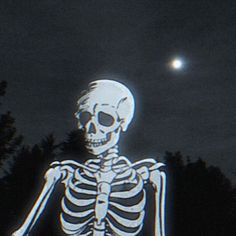 a skeleton is standing in front of the moon