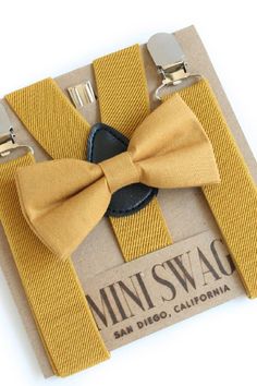 Loved the suspenders for my sons smash cake!! A little pricey, but they were adorable and well worth it!! #krystalwedding Groomsmen Fall Wedding, Fall Wedding Cake, Toddler Bow Ties, Yellow Bow Tie, Suspenders For Boys, Bearer Outfit, Bowtie And Suspenders, Yellow Bow, Ring Bearer Outfit