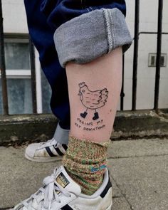 a person with a chicken tattoo on their left leg and the words i love my chickens written in black ink