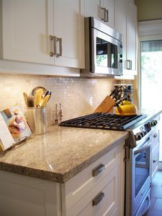 the kitchen counter is clean and ready to be used as a cook's space