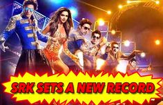 a group of people on stage with the words srk sets a new record in front of them