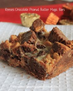 two pieces of chocolate peanut butter magic bars