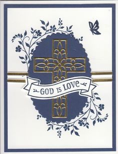 a card with the words god is love and a cross on it, in gold foil