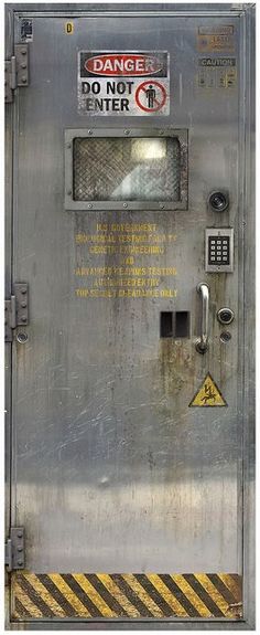 a metal door with a do not enter sign on it's front and side