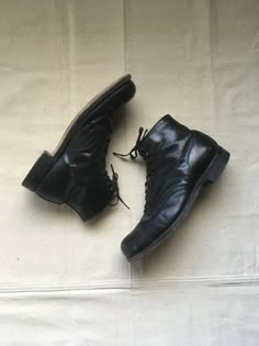 "1920s men's ankle boots work wear black leather leather sole steel toe cap toe 10 eyelet- top 4 hook Good Year Wing Foot heel cap brown leather lined felt lined tongue steel arch good vintage condition, light wear light marks, fade, scuffs, nicks-esp. toes (see photos) marked size 8, see below measures, insole-10 3/4\" sole-11 3/4\" width-4 1/4\" heel-1 1/2\" total height-6\"" Fitted Leather Sole Work Boots With Round Toe, Fitted Work Boots With Leather Sole And Round Toe, Vintage Black Plain Toe Boots, Vintage Black Lace-up Boots With Round Toe, Vintage Lace-up Cap Toe Boots With Leather Sole, Vintage Lace-up Boots With Cap Toe And Leather Sole, Vintage Goodyear Welted Cap Toe Boots, Vintage Black Plain Toe Work Boots, Vintage Leather Cap Toe Boots