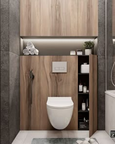 a modern bathroom with wood paneled walls and flooring, including a white toilet