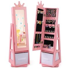 a pink jewelry cabinet with two mirrors on it