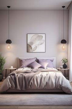 a large bed sitting under two lamps next to a painting on the wall in a bedroom