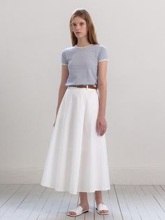 This product, the Fiona A-Line Belt Skirt, epitomizes elegance and simplicity with its clean lines and classic silhouette. Designed with an A-line shape, it flatters the figure while providing a comfortable fit. The included belt accentuates the waist, adding a touch of sophistication to the overall look. - This Fiona A-Line Belt Skirt features a high-waisted design that enhances the figure.- The skirt comes with a stylish belt, perfect for adding a refined touch.- Made from premium fabric, it ensures both comfort and durability.- Its versatile design allows for easy pairing with a variety of tops, making it suitable for both casual and formal occasions.- The A-line silhouette provides a timeless look that never goes out of style. Classic Fitted A-line Bottoms, Classic A-line Skirt For Summer, Classic A-line Summer Skirt, Classic Flowy Skirt For Summer, Classic A-line Flowy Skirt, Classic Summer Midi Skirt, Classic Flowy Summer Skirt, Classic Cotton Flared Skirt, Classic Full Skirt For Summer