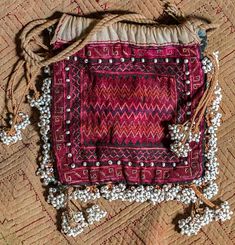 Embroidered Textiles, Kutch Work Designs, Flowers Embroidered, Kutch Work, Ethnic Bag, Desert Flowers, Islamic Culture, Embroidered Bodice, Afghan Dresses