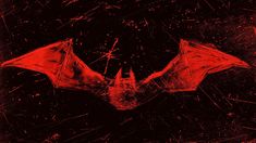 a red bat on a black background with splats and paint streaks around it